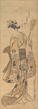 Yaoya O Shichi Standing, Holding a Love Letter and a Battledore, ca. 1748., ca. 1748. Creator: Okumura Masanobu.