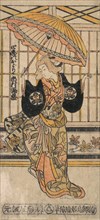 The Actor Ichimura Uzaemon VIII 1699-1762 as a Woman with Parasol. Creator: Torii Kiyomasu I.