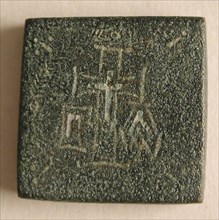 Copper-Alloy Balance Weight with a Cross in a Wreath, Byzantine, 5th-6th century.