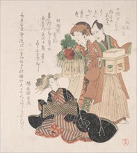 Actor Nakamura Utayemon with Two Women Preparing for the New Year Ceremony, 19th century.