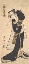 The Actor Segawa Kikunojo III as a Woman in Black Robe Holding a Straw Hat, 1798.