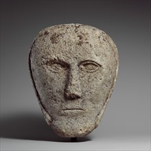 Head of a Man Wearing a Cap or Helmet, Celtic, possibly 2nd-3rd century.