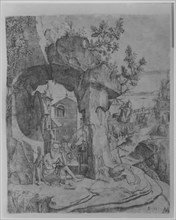 Saint Jerome seated beneath a rocky arch
