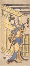 The Actor Nakamura Noshio II, in Female Role, Holding a Shakuhachi (Bamboo Flute), 1796 (Kansei, 6th year).