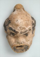 Head Pendant, Coptic, 4th-7th century.
