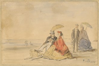 A Couple Seated and a Couple Walking on the Beach