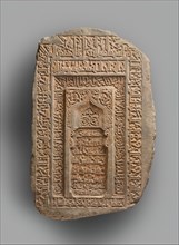 Tombstone of Abu Sa'd ibn Muhammad ibn Ahmad al-Hasan Karwaih, Iran, dated A.H. 545/A.D. 1150.