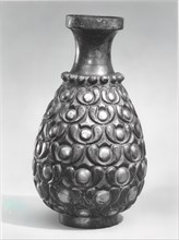 Pear-Shaped Vase, Iran, 8th century. Sasanian repoussée.