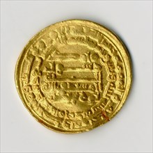 Coin, Iran, dated A.H. 333/ A.D. 945. Minted in the year A.H. 333 at al-Muhammadiya, incription names the prophet Muhammad and reigning Samanid ruler, Nuh bin Nasr with sura 112 of the Qur?an.