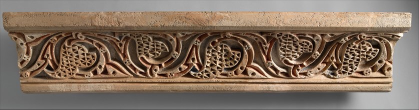 Fragment of a Painted Cornice Panel with Scrolling Vines, Iran, 11th century.