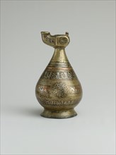 Ewer with Lamp-Shaped Spout, Iran, 12th century. Arabic inscriptions of good wishes to the owner.