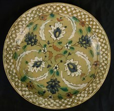Dish with Floral Designs on an Olive Background, Iran, 16th-17th century.