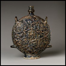 Flask with Zodiac Medallions, Iran, first half 14th century, with additions first half 20th century. Gemini and Sagittarius in centre.