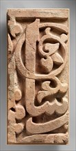Fragment of a Frieze, Iran, 11th century. The frieze's inscription may have originally named Seljuq sultan Malik Shah (r. 1073-92).