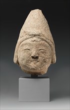 Head of a Central Asian Figure in a Pointed Cap, Iran, 12th-early 13th century.