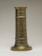 Engraved Lamp Stand with a Cylindrical Body, Iran, second half 16th century. Safavid lamp stand with inscriptions in Persian nasta?liq script, which contain lines from the poem "The Moth and The Candl...