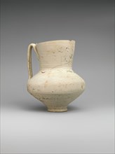 Unglazed Jug with Writing, Iran, 8th-9th century. Entire surface covered with writing, with faint image of a demon possibly an incantation vessel.