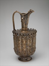 Ewer, Iran or Afghanistan, ca. 1180-1210. Harpies and astrological imagery heighten the auspiciousness of this ornament