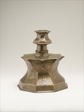 Candlestick with Figural Imagery, Iran or Iraq, first half 14th century. Nine-sided candlestick with depictions of courtly pastimes