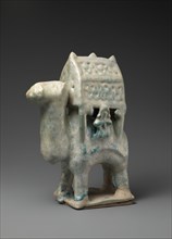 Figurine in the Form of a Camel Carrying a Palanquin and Two Riders, probably Iran or Iraq, 12th-early 13th century.