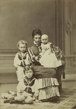 Grand Duchess Maria Fyodorovna with children, Nicholas Alexandrovich, George Alexandrovich and Xenia Alexandrovna, c. 1875. Private Collection.