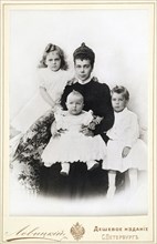 Grand Duchess Xenia Alexandrovna of Russia with children Irina Alexandrovna, Andrei Alexandrovich and Feodor Alexandrovich , 1903. Private Collection.