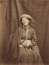 Woman Holding a Dead Bird, Surrey County Asylum, c. 1855.