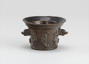 Mortar with Sun, Moon, and Dolphin-shaped Handles, early 16th century.