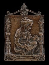 Madonna and Child between Two Candelabra.