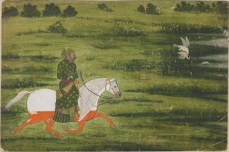 A mounted man hunting birds with a falcon, early 18th century.