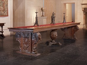 Large Walnut Table with Uberti Arms, c. 1500.