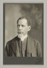 Cabinet card of Rev. G.H.S. Bell, February-March 5, 1894. Creator: C. M. Bell Studio.