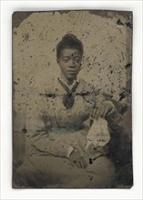 Tintype of a woman, 1856-1900. Creator: Unknown.
