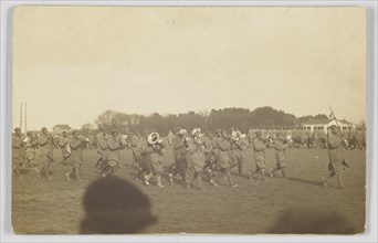 Photographic postcard of a military marching band, ca. 1917. Creator: Unknown.