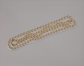Pearl necklace from Mae's Millinery Shop, 1941-1994. Creator: Unknown.