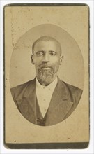 Photograph of a man with a beard wearing a dark colored suit and vest, late 19th cent - early 20th c Creator: Unknown.