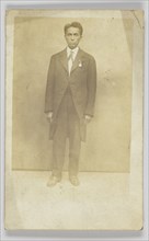 Photographic postcard of a man in a suit, 1904-1918. Creator: Unknown.