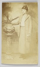 Photographic postcard of a woman, 1918-1930. Creator: The Rex Photo Studio.