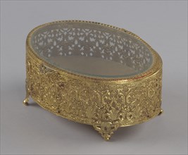 Gold metal scrollwork jewelry box from Mae's Millinery Shop, 1941-1994. Creator: Unknown.