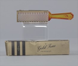 Plastic brush with box from Mae's Millinery Shop, 1941-1994. Creator: Gold Tone.