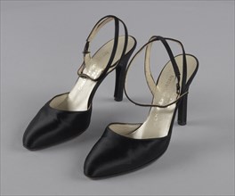 Pair of black stiletto heel shoes by Charles Jourdan from Mae's Millinery Shop, 1941-1994. Creator: Charles Jourdan.