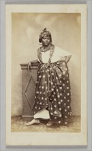 Photograph of unidentified woman wearing French Antillean dress, 1860-1880. Creator: Unknown.
