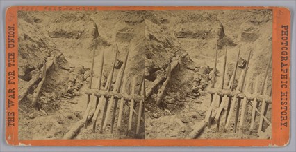 Stereograph of two deceased Confederate soldiers in a trench, 1865. Creator: Thomas C. Roche.
