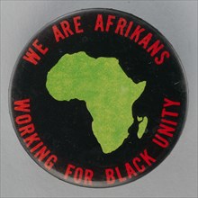 Pinback button promoting black unity, mid 20th century. Creator: Unknown.