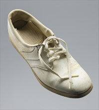 Golf shoe belonging to Ethel Funches, late 20th century. Creator: FootJoy.