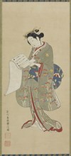 Young woman reading a letter, Edo period, 1711-1785. Creator: Ishikawa Toyonobu.