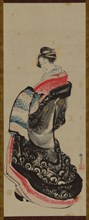 A courtesan standing, late 18th-early 19th century. Creator: Hokusai.