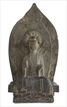 Seated figure of the Buddha Sakyamuni in high relief, Period of Division, 534-550. Creator: Unknown.