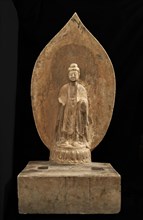 Buddhist tablet: standing figure in high relief; right hand missing, Period of Division, 551 CE. Creator: Unknown.