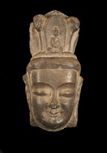 Head of Bodhisattva in high relief, with high headdress..., Period of Division, 386-535. Creator: Unknown.